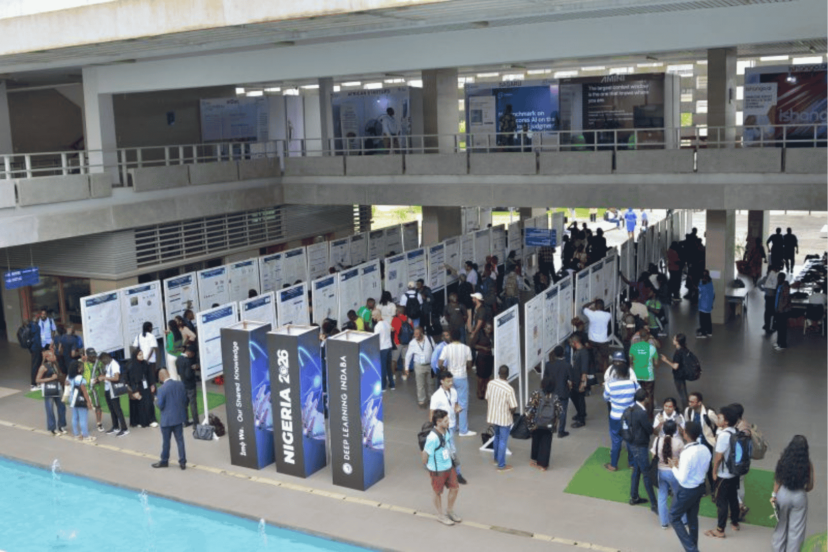 Researchers presenting their work and exchanging ideas during the poster sessions. 